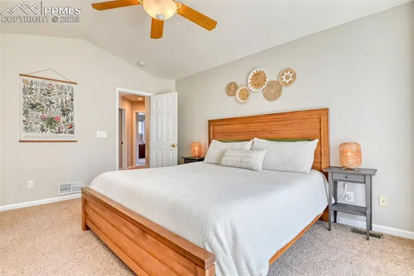 a bathroom with a tub and shower view