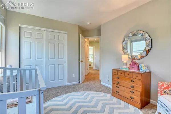 a room with furniture and a window