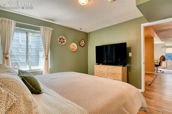 a front view of house with yard and outdoor seating