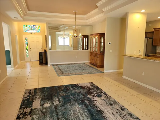 a view of a yard with a tree