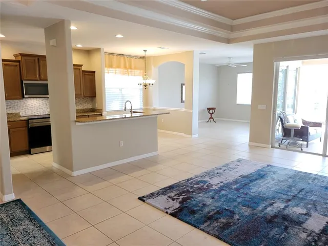 a bedroom with a bed and lamp