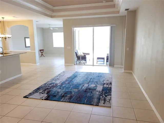 a white toilet sitting next to a bath tub shower