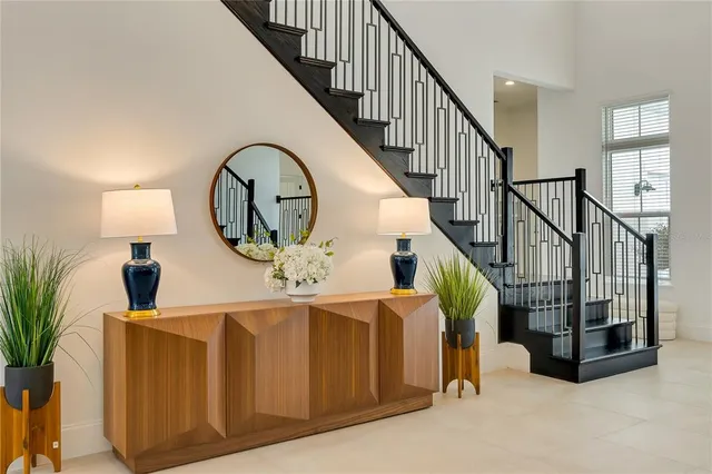 a view of an empty room and entryway