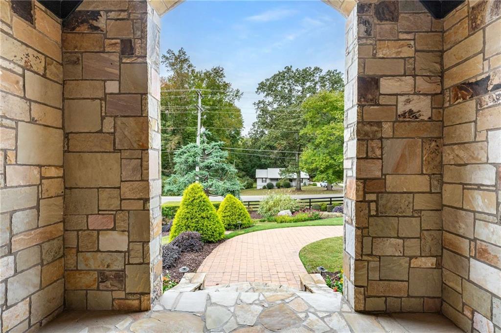 16050 South Thompson Road Milton, GA 30004 - Photo 15 of 72 a view of a garden