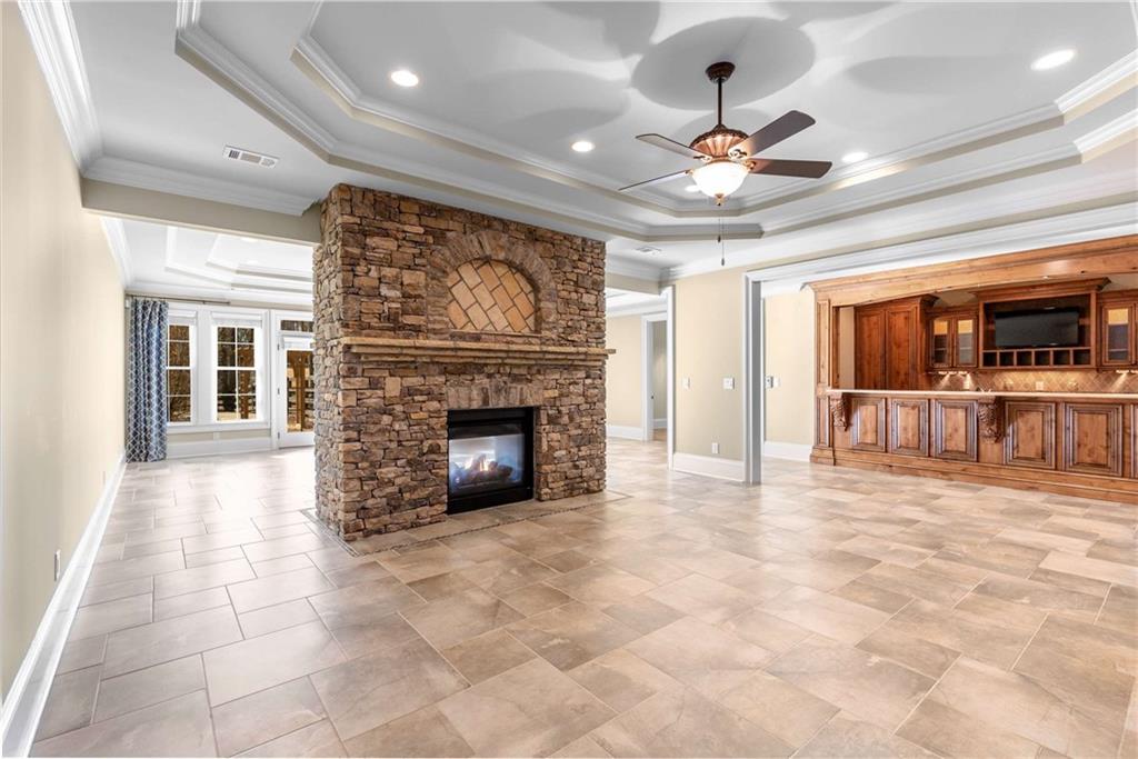 16050 South Thompson Road Milton, GA 30004 - Photo 60 of 72 a view of an empty room with a fireplace and a window