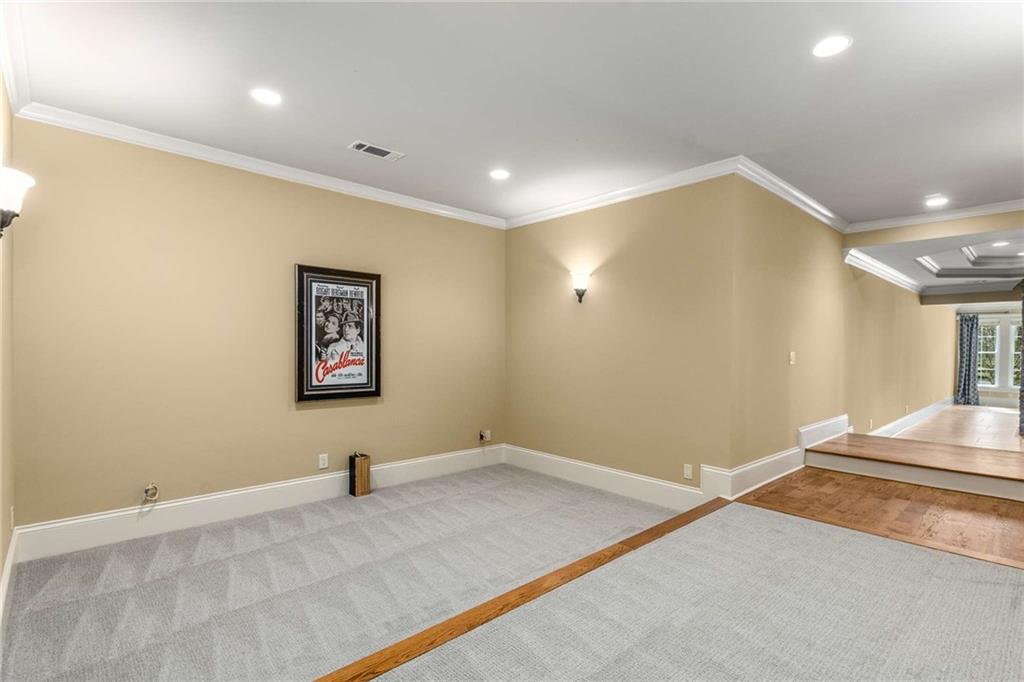 16050 South Thompson Road Milton, GA 30004 - Photo 67 of 72 a view of a livingroom with an empty space and a window