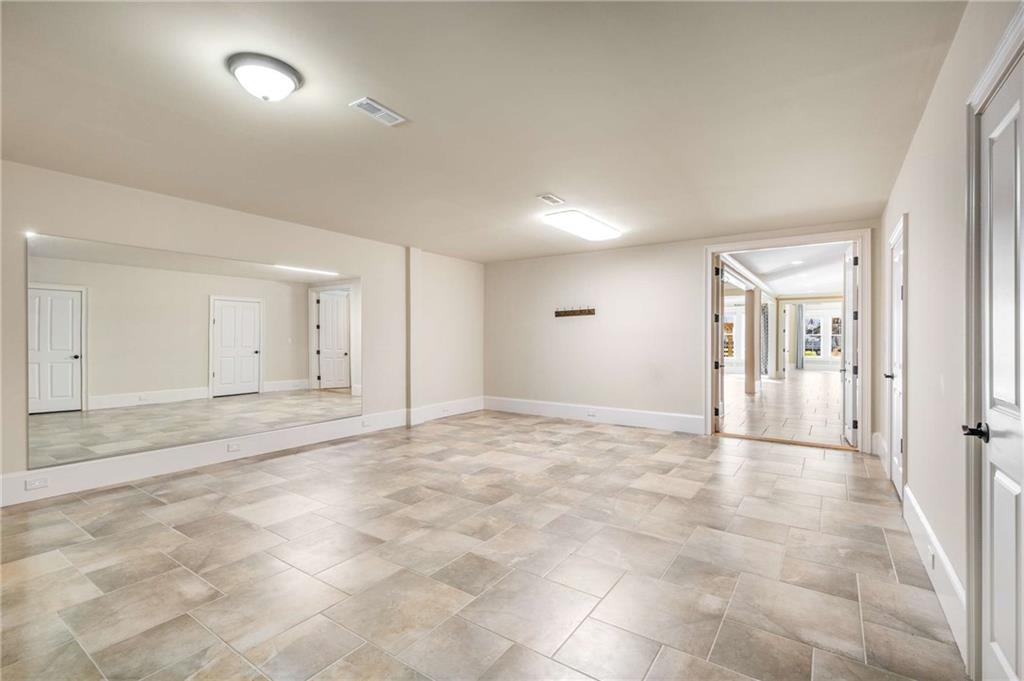 16050 South Thompson Road Milton, GA 30004 - Photo 69 of 72 a view of an empty room