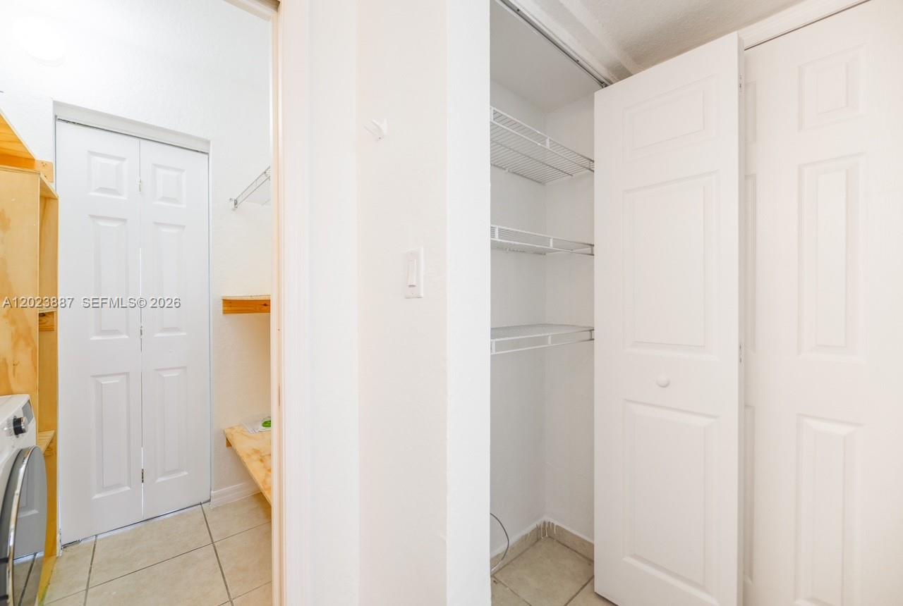 7737 Southwest 88th Street, Unit C312 Miami, FL 33156 - Photo 27 of 32 a view of closet
