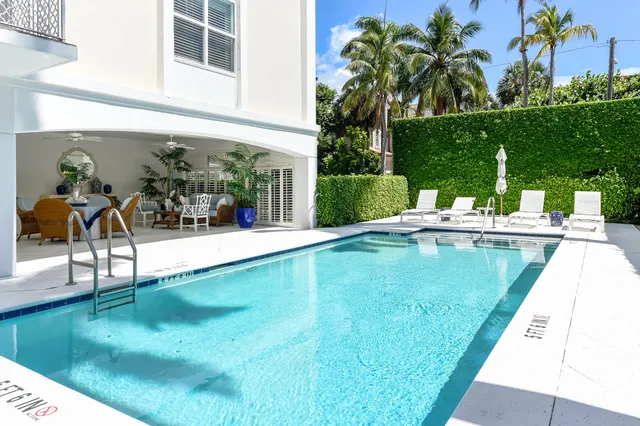 a view of swimming pool with a patio