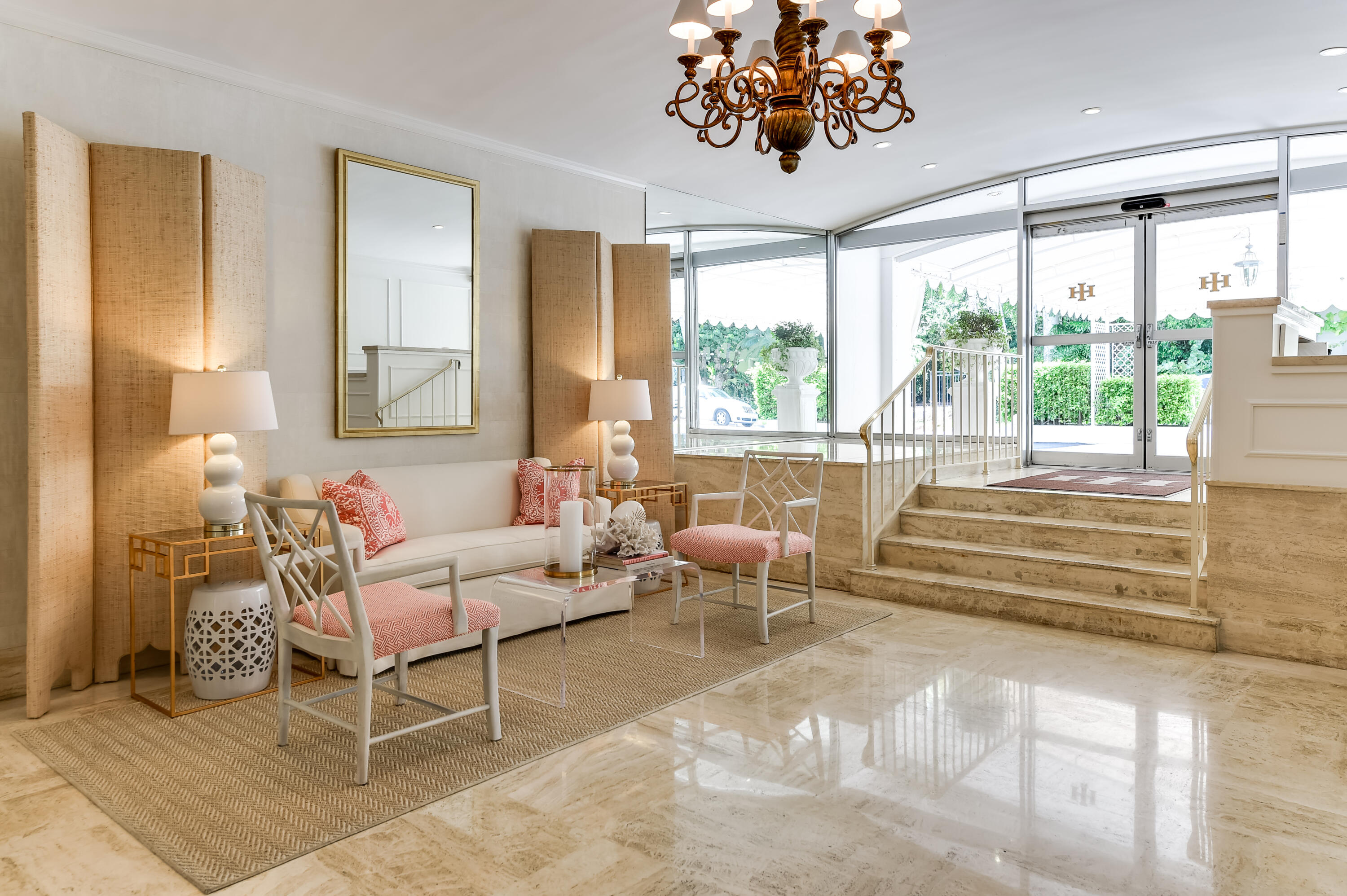 354 Chilean Avenue, Unit 2D Palm Beach, FL 33480 - Photo 3 of 11 a living room with furniture and a large window