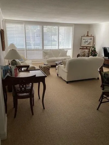 a bedroom with a bed and a desk