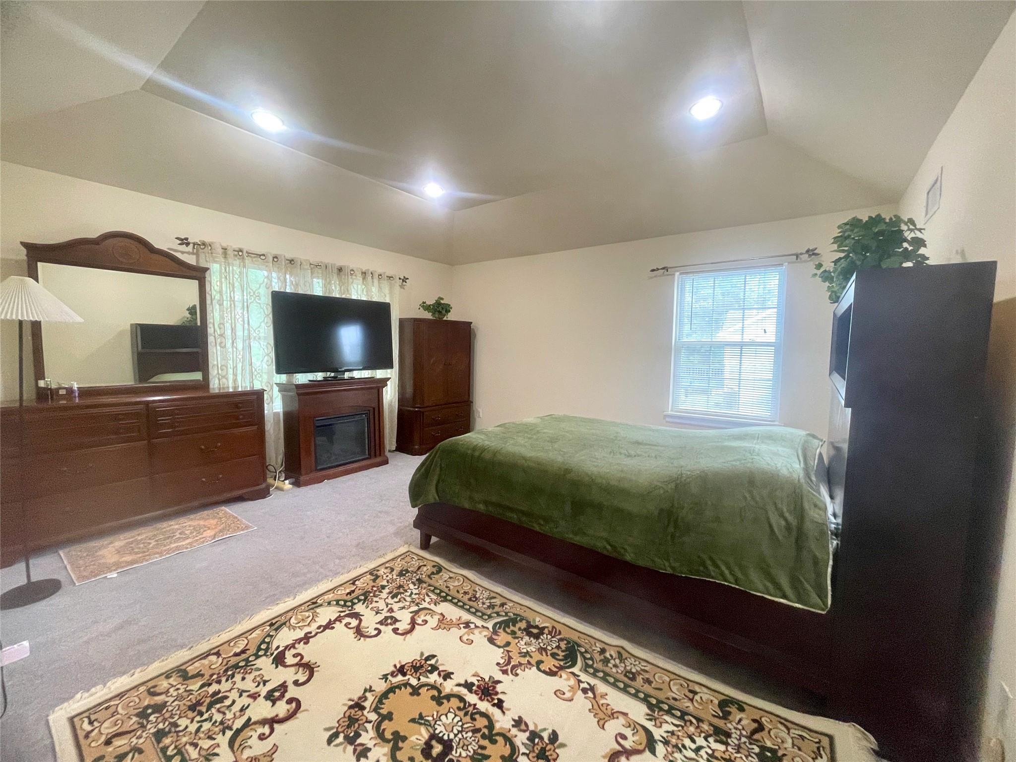 24 3rd Street Middletown, NY 10940 - Photo 12 of 34 a bedroom with a bed and a flat screen tv