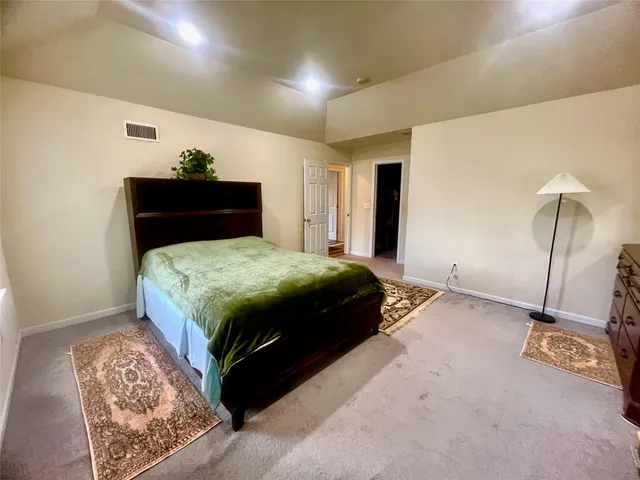 a spacious bathroom with a tub and a shower