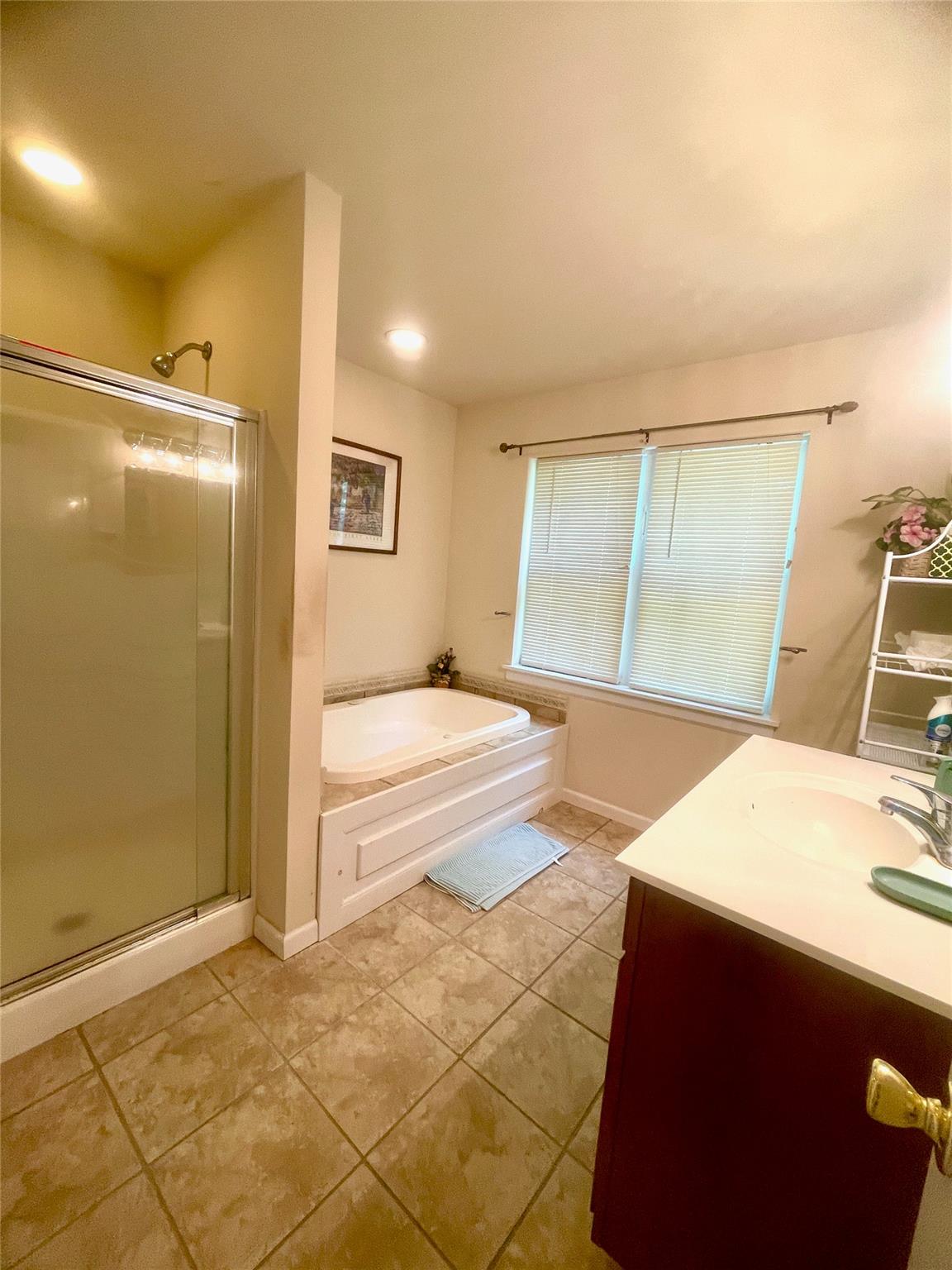 24 3rd Street Middletown, NY 10940 - Photo 14 of 34 a spacious bathroom with a tub and a shower