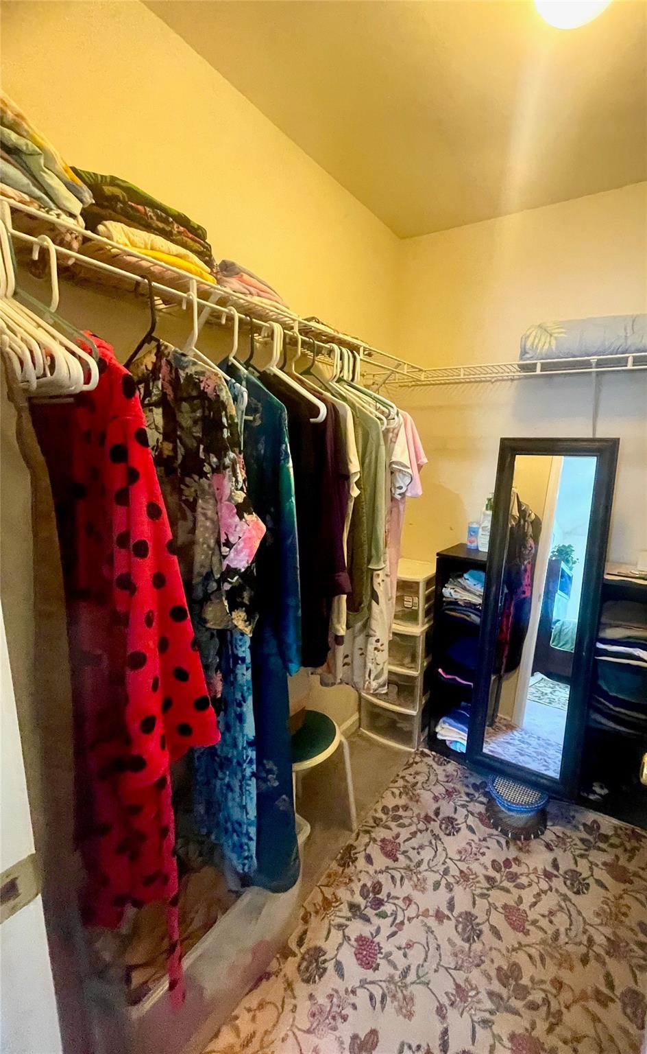 24 3rd Street Middletown, NY 10940 - Photo 16 of 34 a view of walk in closet with clothes and shoes