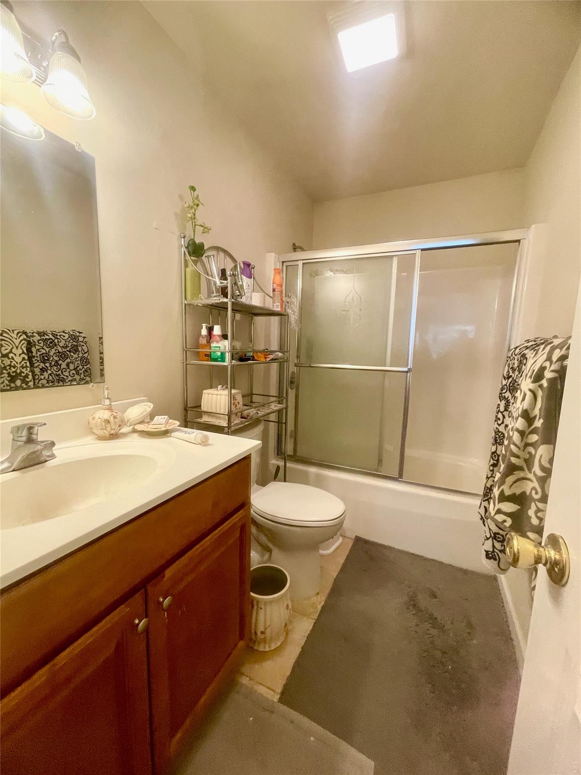 24 3rd Street Middletown, NY 10940 - Photo 19 of 34 a bathroom with a sink toilet and shower