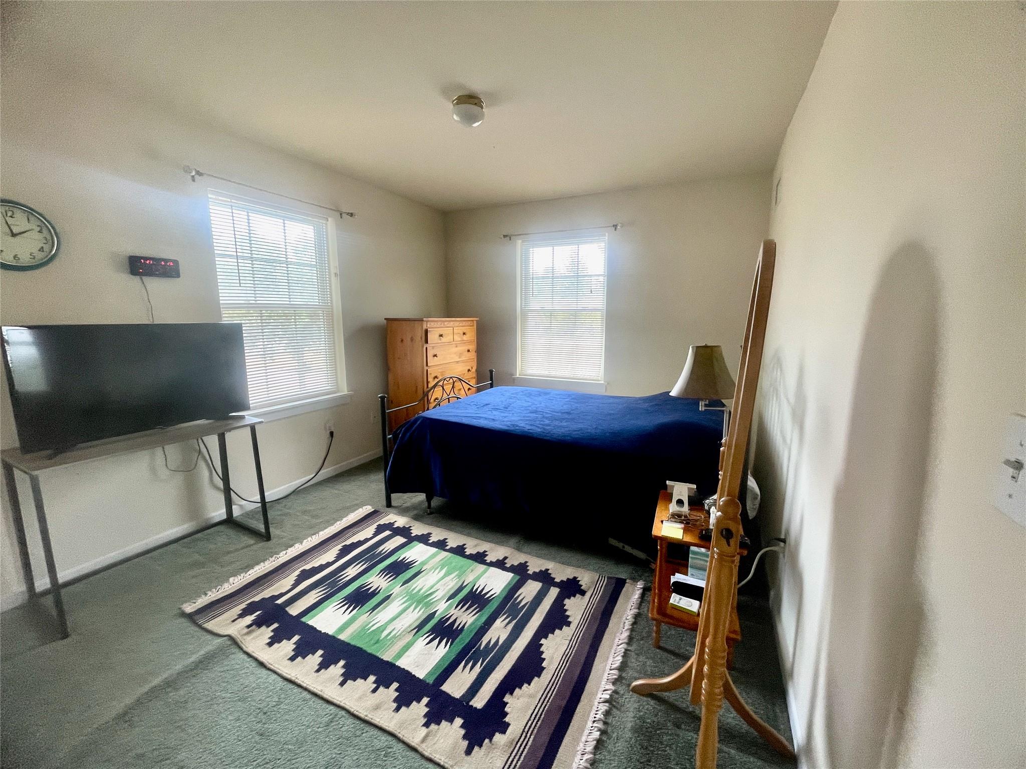 24 3rd Street Middletown, NY 10940 - Photo 22 of 34 a living room with furniture and a flat screen tv