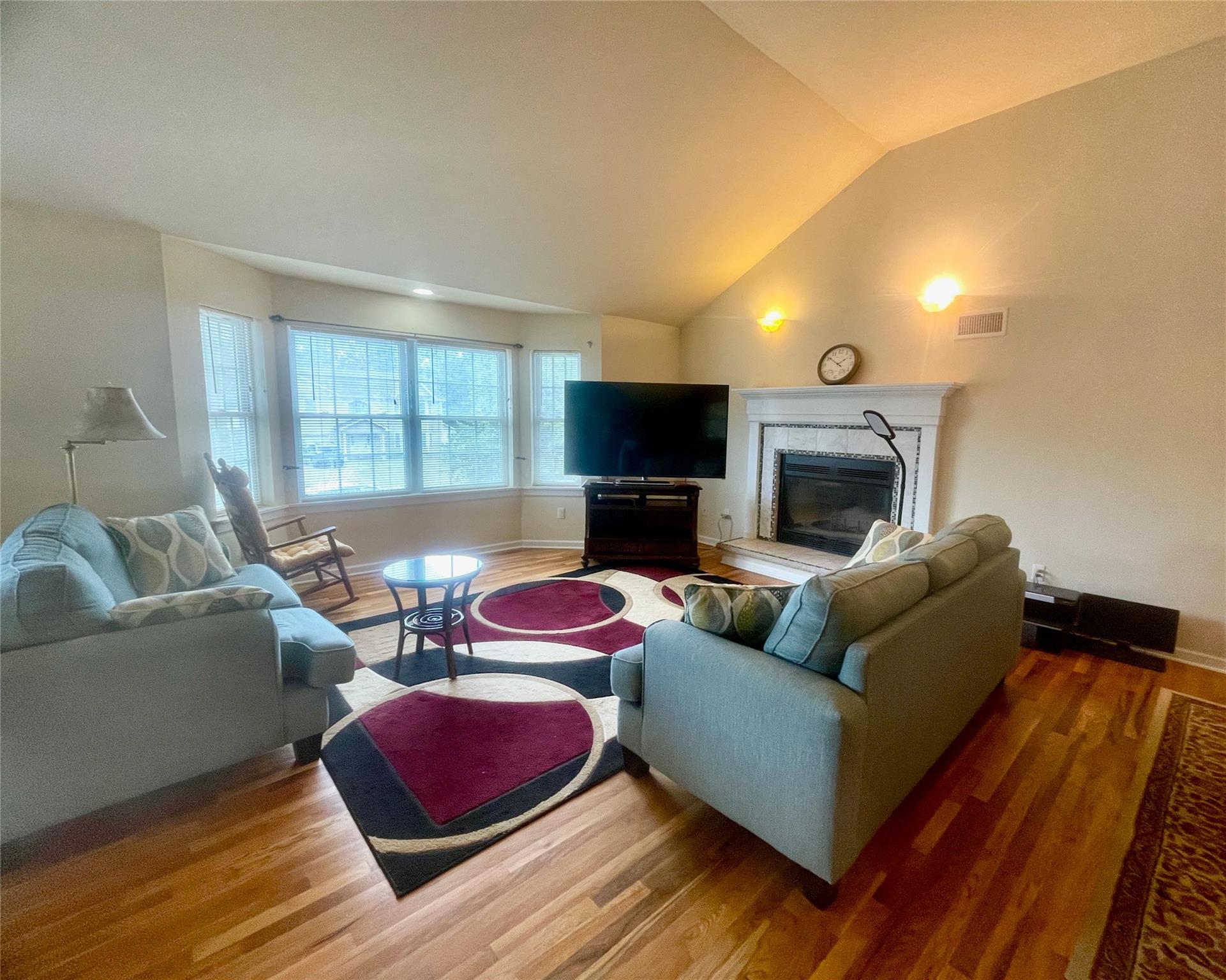 24 3rd Street Middletown, NY 10940 - Photo 3 of 34 a living room with furniture and a fireplace