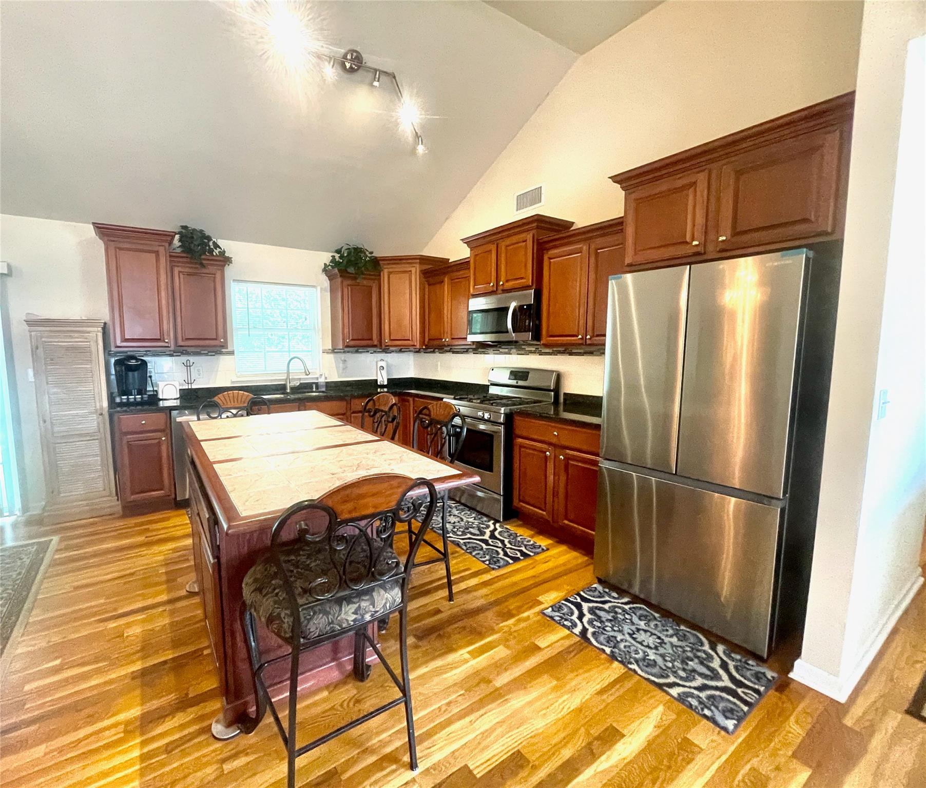 24 3rd Street Middletown, NY 10940 - Photo 6 of 34 a kitchen with stainless steel appliances a refrigerator a stove a sink dishwasher and a refrigerator