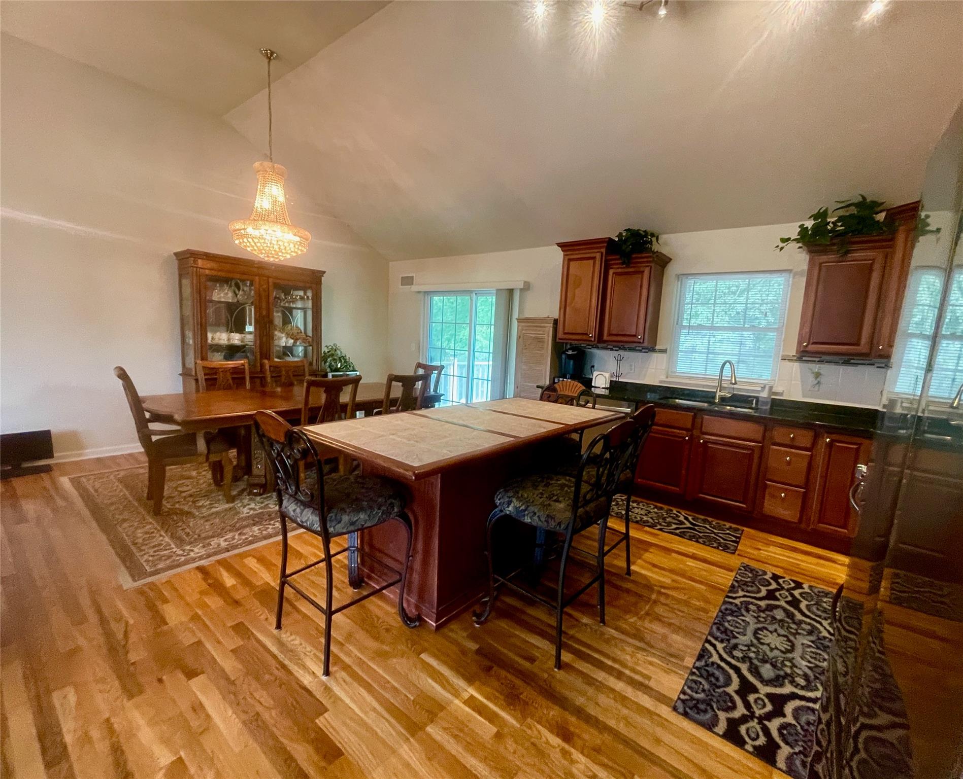 24 3rd Street Middletown, NY 10940 - Photo 8 of 34 a view of a dining room with furniture and wooden floor