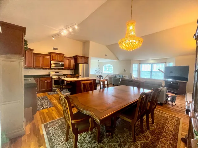 a view of a dining room with furniture