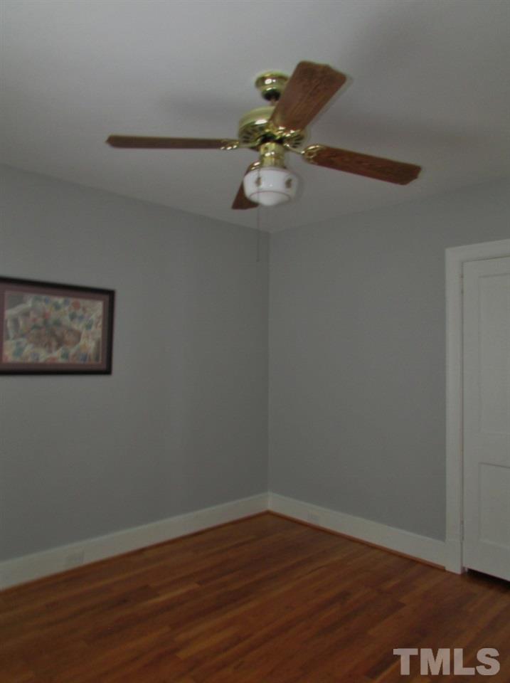 511 Chub Lake Street Roxboro, NC 27573 - Photo 12 of 23 This Bedroom has the original hardwood floors that have been refinished.