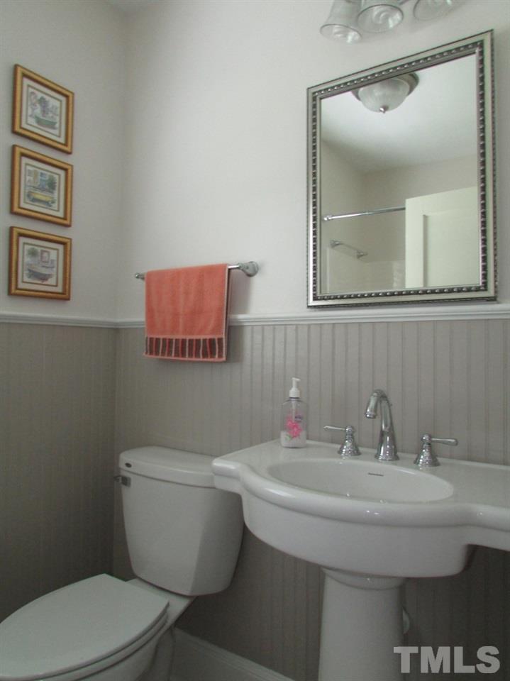 511 Chub Lake Street Roxboro, NC 27573 - Photo 13 of 23 Remodeled Bath with pedestal sink, tub/shower combo.