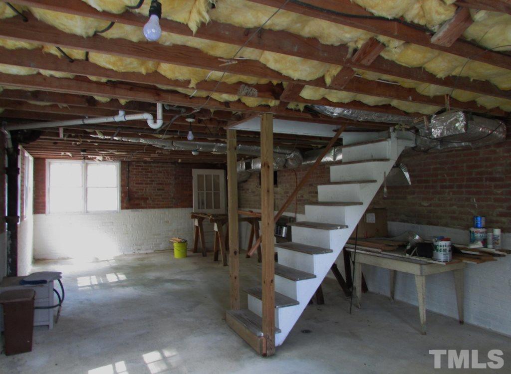 511 Chub Lake Street Roxboro, NC 27573 - Photo 15 of 23 The basement has an area that is heated which would make a great shop. Outside and inside entry to basement.