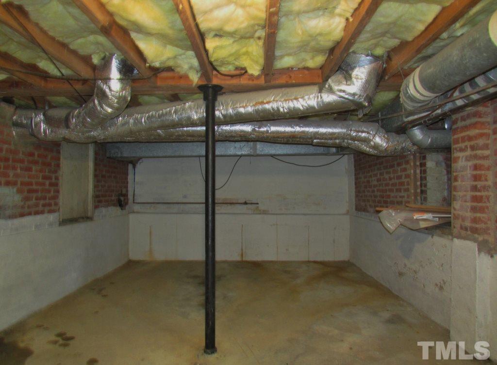 511 Chub Lake Street Roxboro, NC 27573 - Photo 16 of 23 Also in the basement is plenty of storage and a half bath.