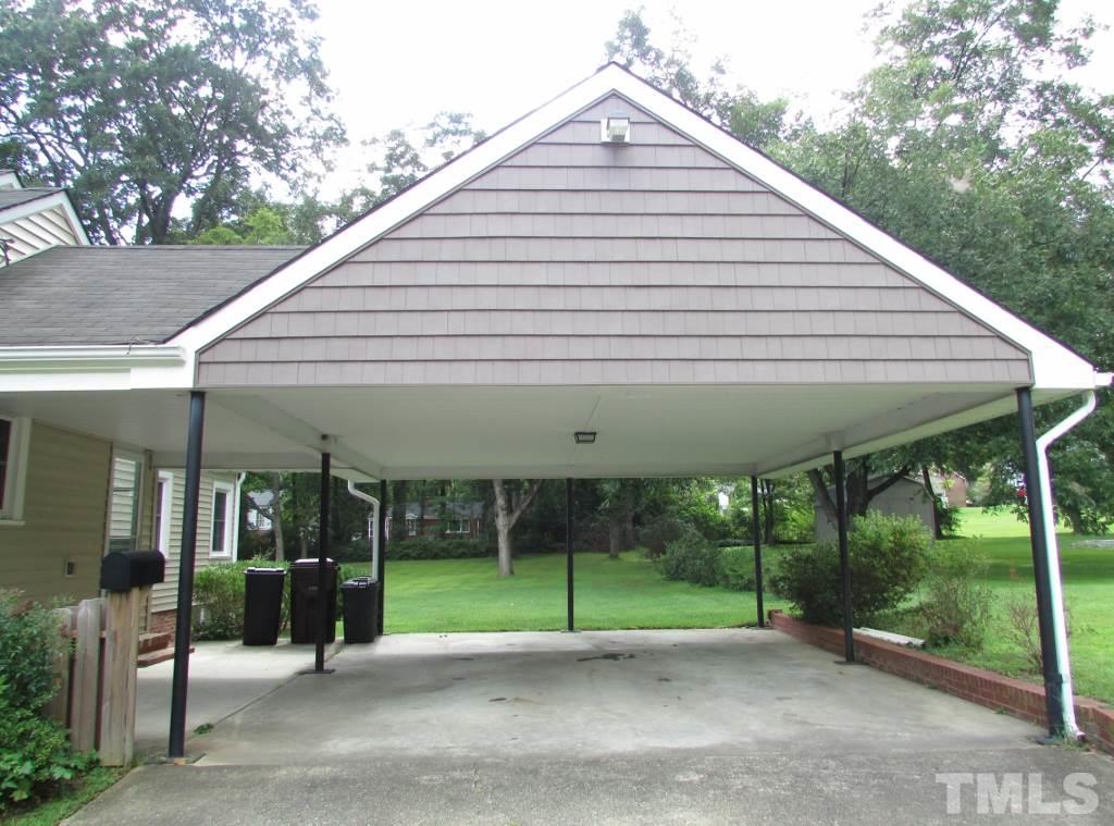 511 Chub Lake Street Roxboro, NC 27573 - Photo 20 of 23 2 car carport, concrete drive, and covered grilling area are a great feature of this home.
