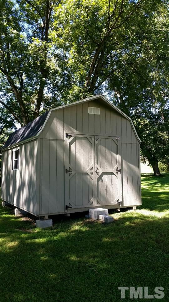511 Chub Lake Street Roxboro, NC 27573 - Photo 22 of 23 There is also storage building for your mower and equipment
