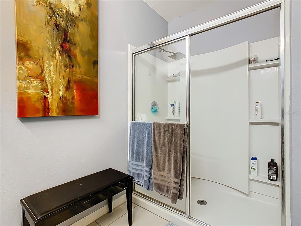 1765 Brockridge Road Kissimmee, FL 34744 - Photo 31 of 45 a bathroom with a shower