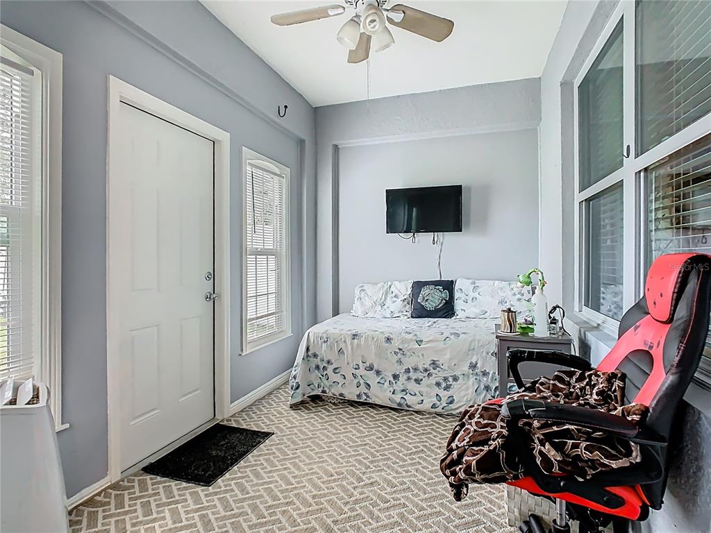 1765 Brockridge Road Kissimmee, FL 34744 - Photo 34 of 45 a bedroom with bed and a window