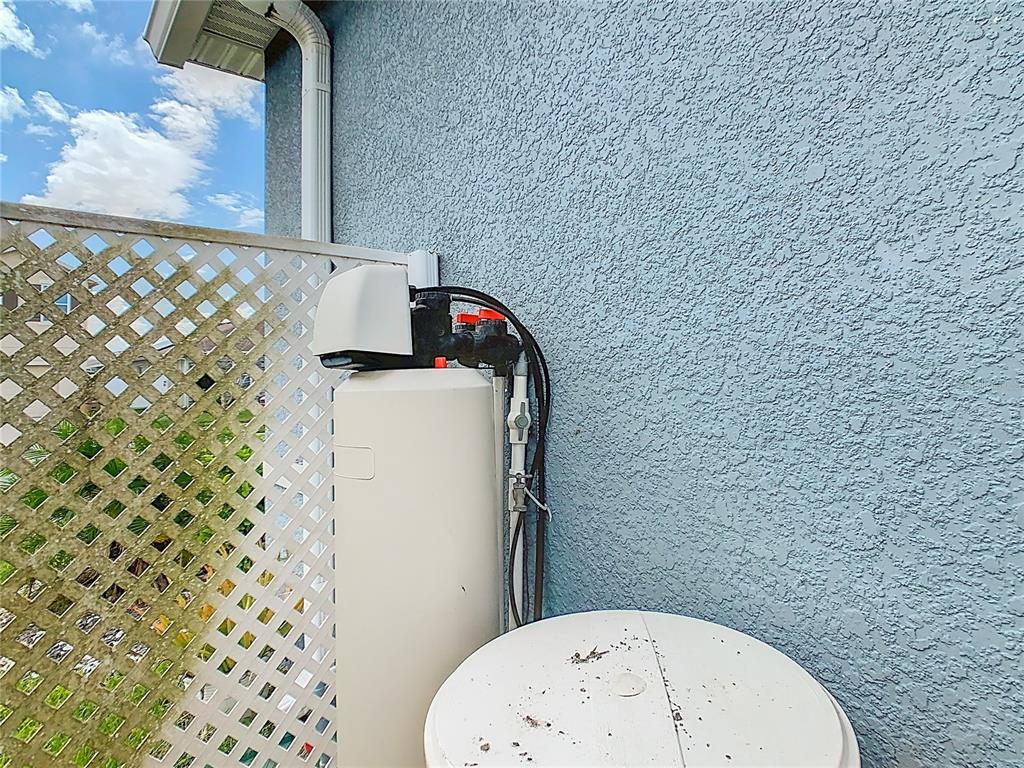 1765 Brockridge Road Kissimmee, FL 34744 - Photo 37 of 45 a bathroom with a toilet and a shower curtain