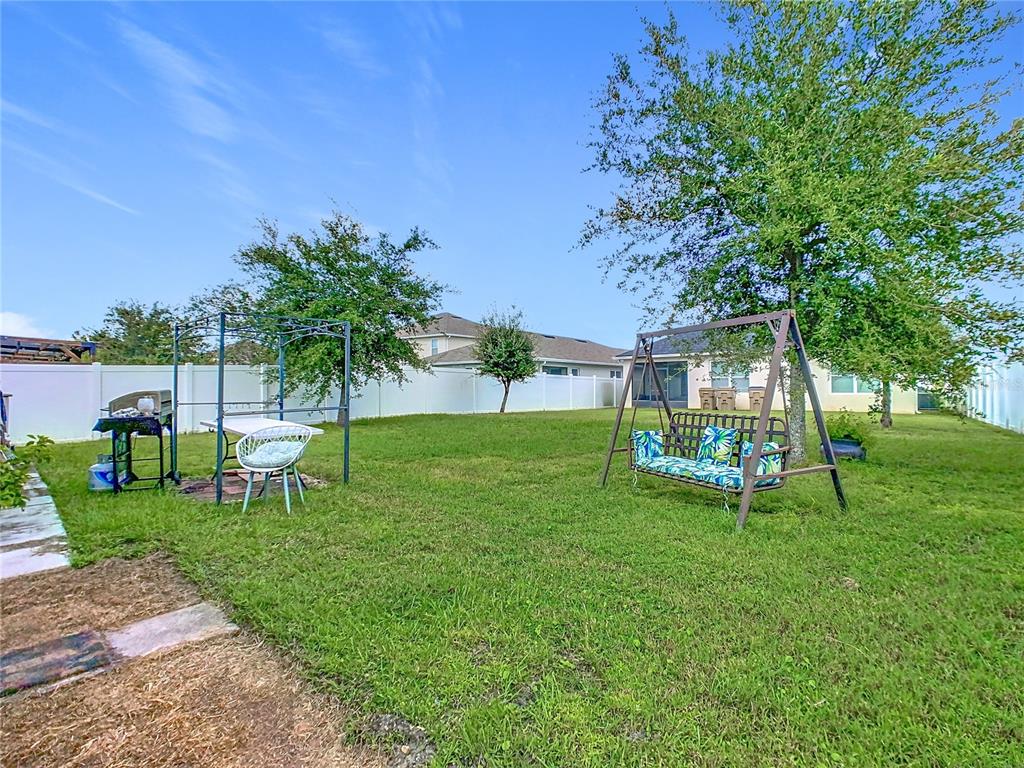 1765 Brockridge Road Kissimmee, FL 34744 - Photo 38 of 45 a view of a park with plants and trees