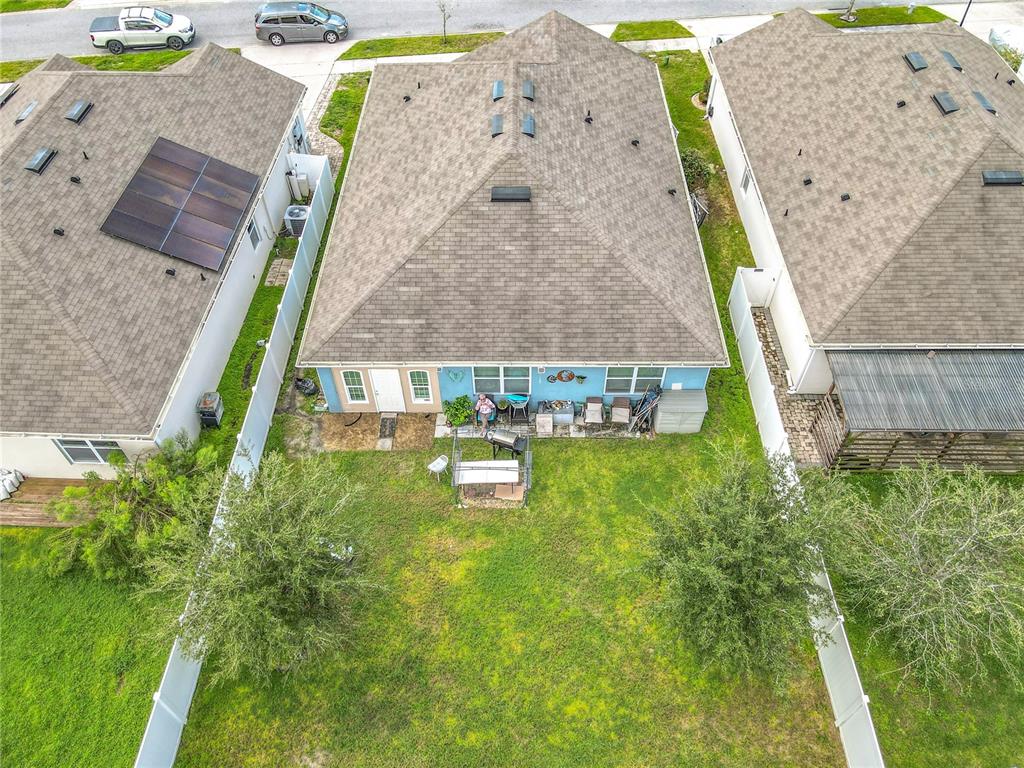 1765 Brockridge Road Kissimmee, FL 34744 - Photo 42 of 45 a view of a swimming pool with a yard