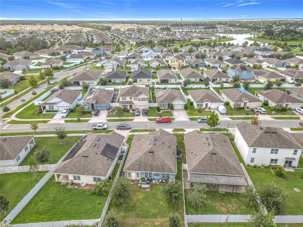 1765 Brockridge Road Kissimmee, FL 34744 - Photo 44 of 45 an aerial view of residential houses with outdoor space and street view