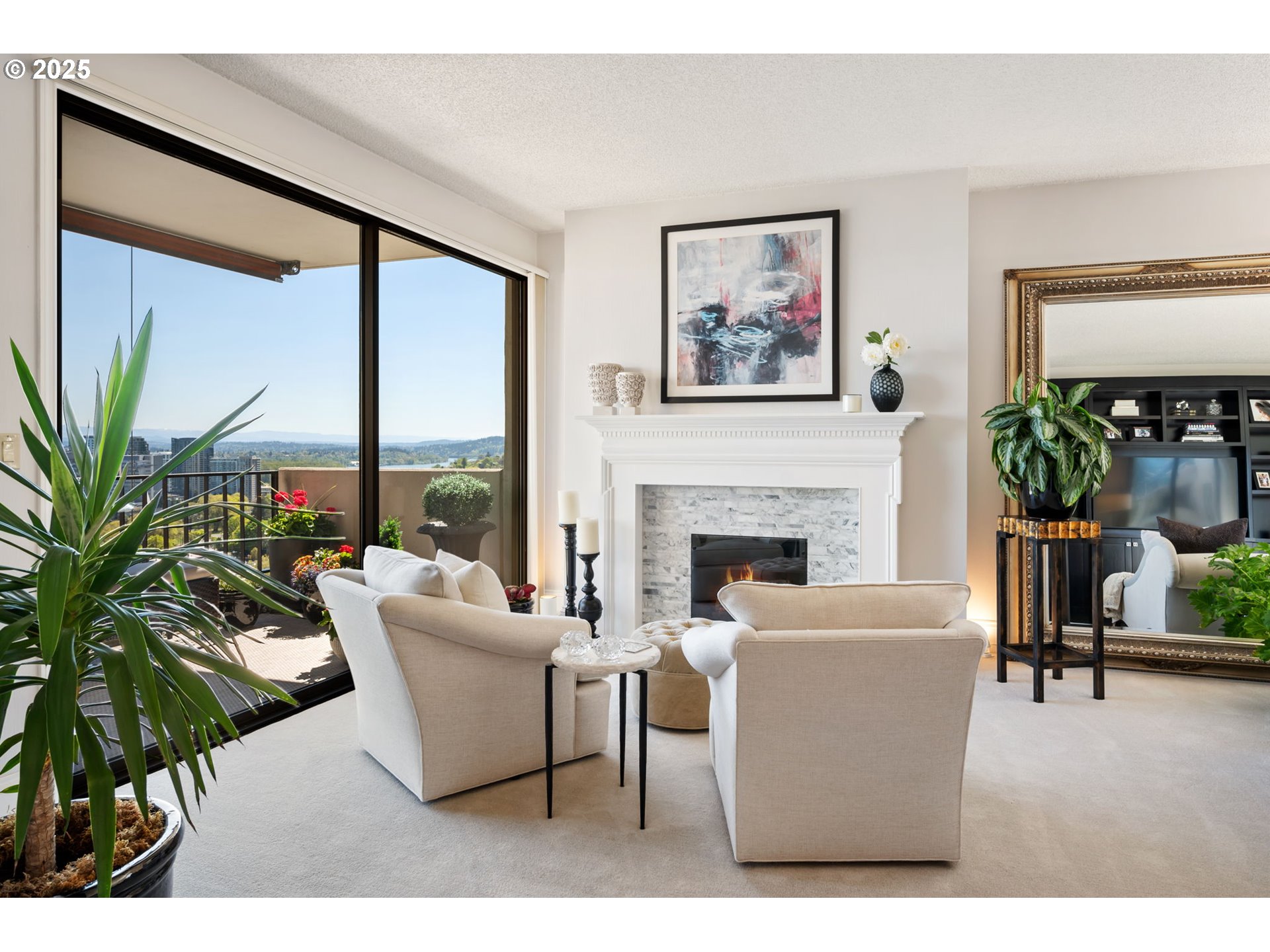 2221 Southwest 1st Avenue, Unit 2225 Portland, OR 97201 - Photo 12 of 47 a living room with furniture a large window and a fireplace