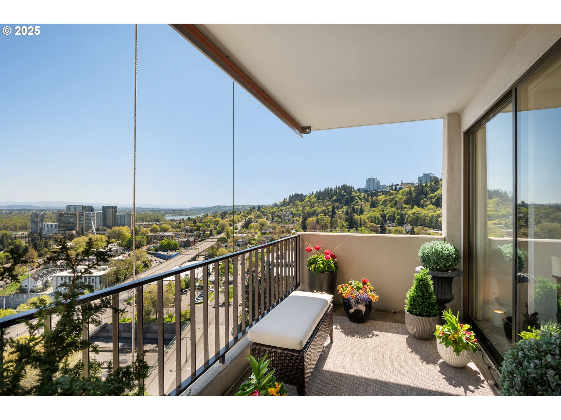 2221 Southwest 1st Avenue, Unit 2225 Portland, OR 97201 - Photo 16 of 47 a view of a balcony with chair and wooden floor