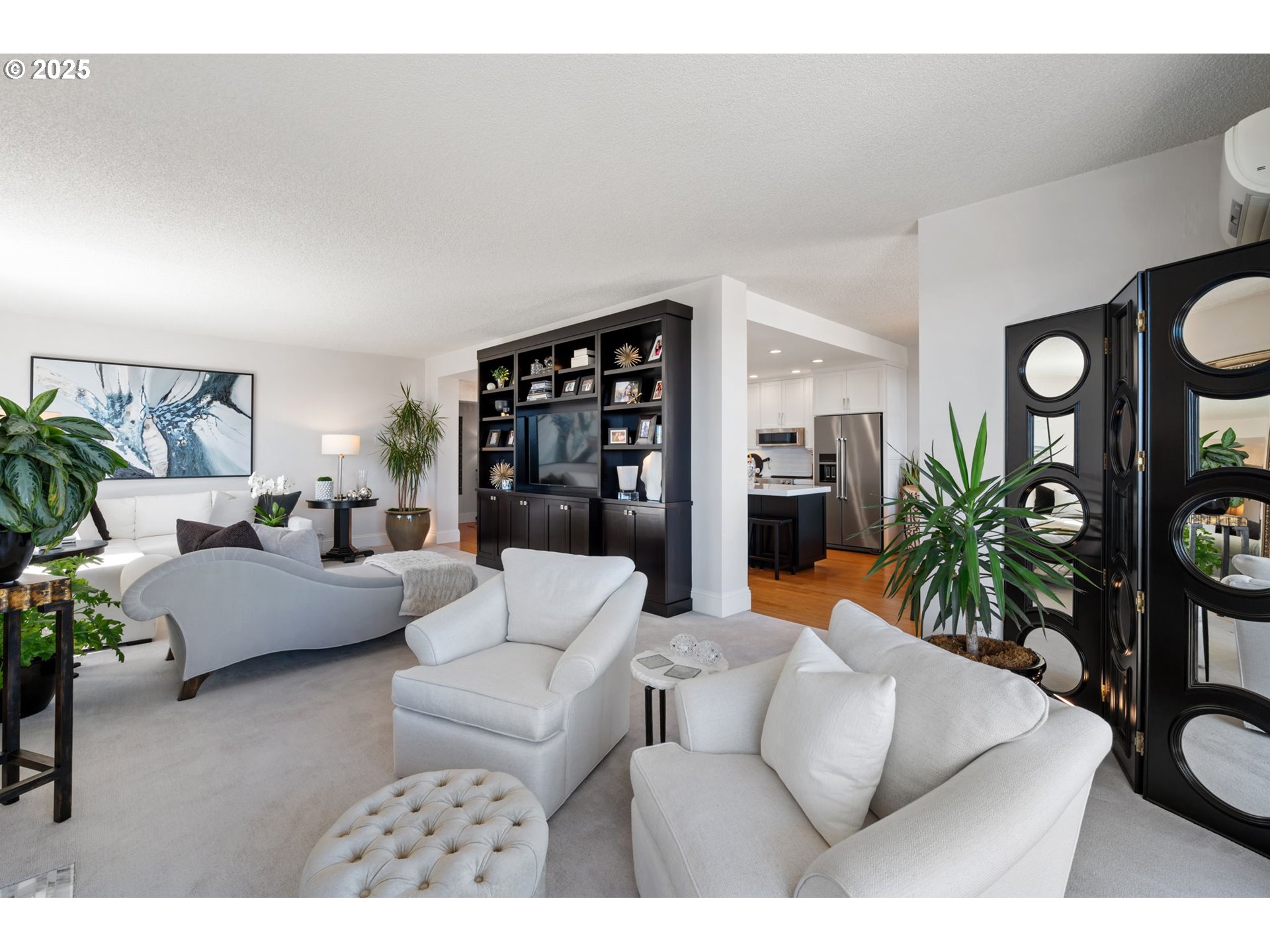 2221 Southwest 1st Avenue, Unit 2225 Portland, OR 97201 - Photo 20 of 47 a living room with furniture and a wooden floor