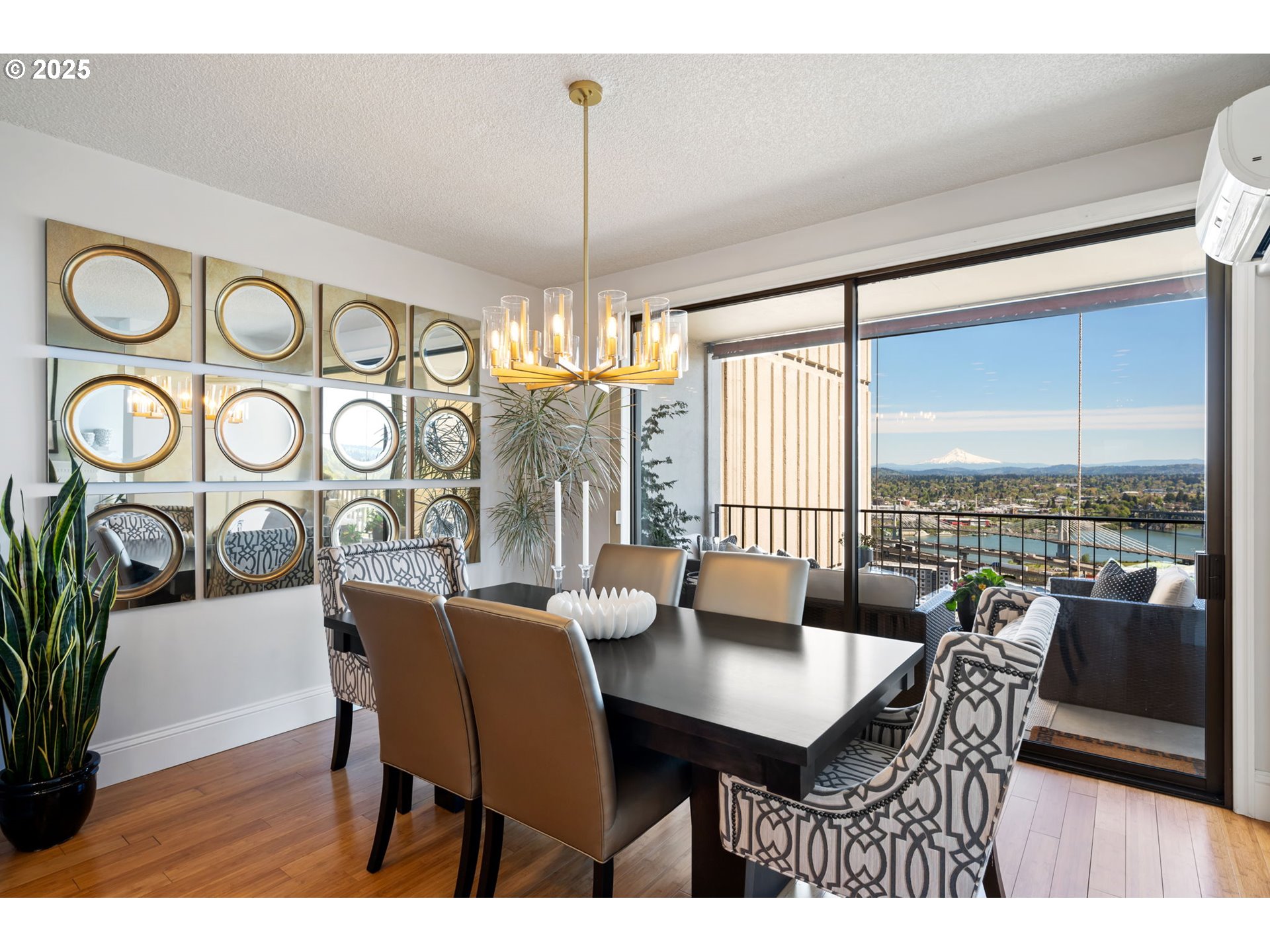 2221 Southwest 1st Avenue, Unit 2225 Portland, OR 97201 - Photo 22 of 47 a view of a dining room with furniture window and wooden floor