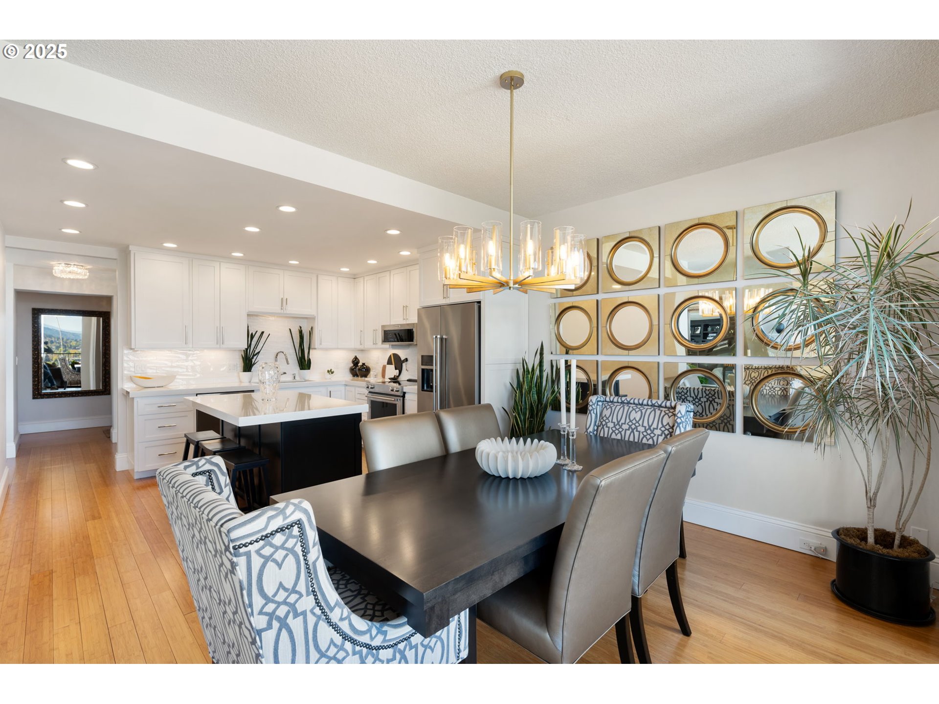 2221 Southwest 1st Avenue, Unit 2225 Portland, OR 97201 - Photo 24 of 47 a dining room with furniture and wooden floor