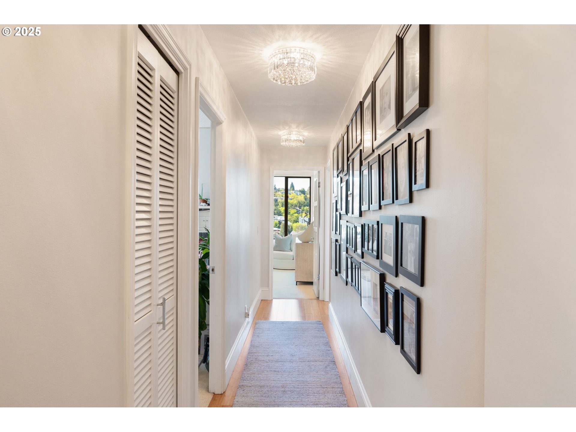 2221 Southwest 1st Avenue, Unit 2225 Portland, OR 97201 - Photo 28 of 47 a view of a hallway with a white walls and stairs