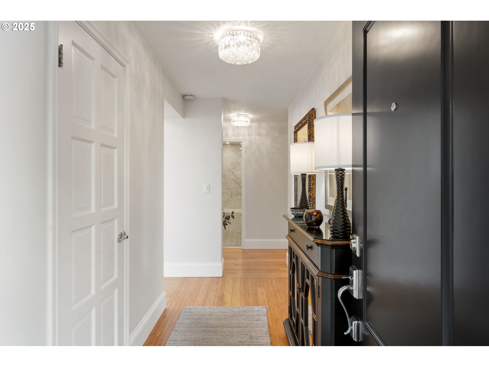 2221 Southwest 1st Avenue, Unit 2225 Portland, OR 97201 - Photo 3 of 47 a bathroom with a sink and a mirror