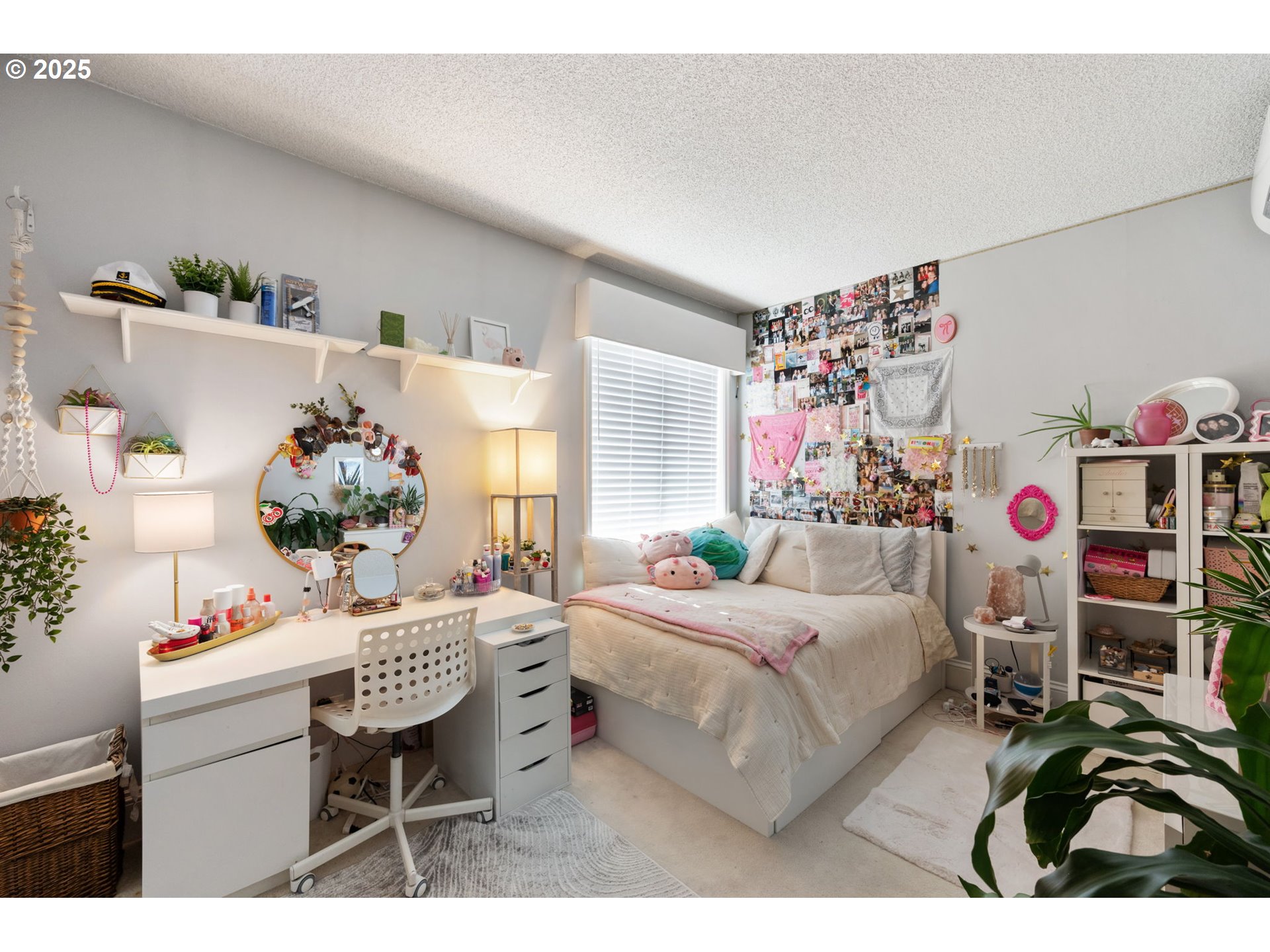 2221 Southwest 1st Avenue, Unit 2225 Portland, OR 97201 - Photo 38 of 47 a bedroom with a bed and a table in it