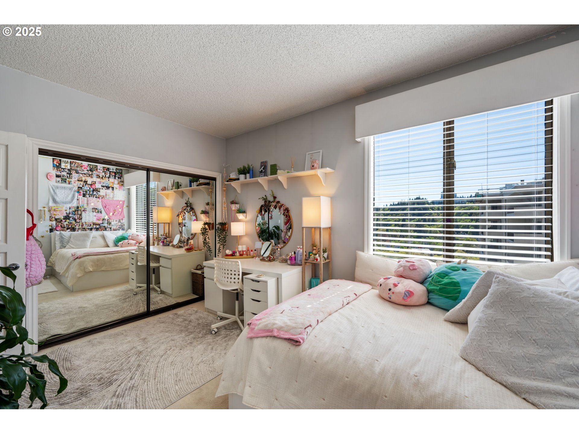 2221 Southwest 1st Avenue, Unit 2225 Portland, OR 97201 - Photo 39 of 47 a bedroom with furniture and a large window