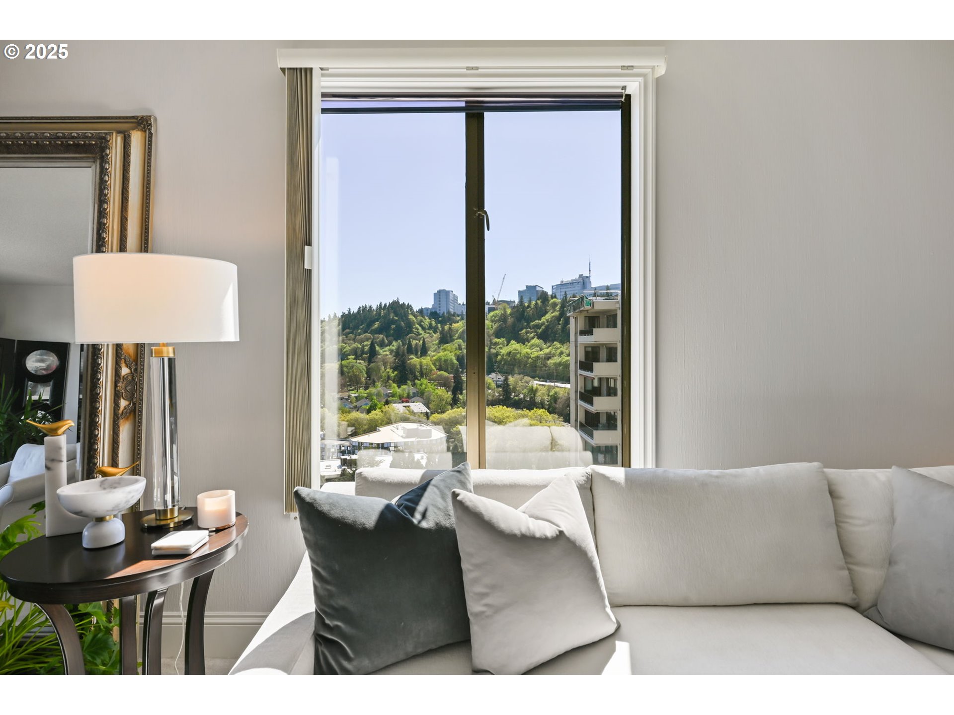 2221 Southwest 1st Avenue, Unit 2225 Portland, OR 97201 - Photo 6 of 47 a living room with furniture and a window