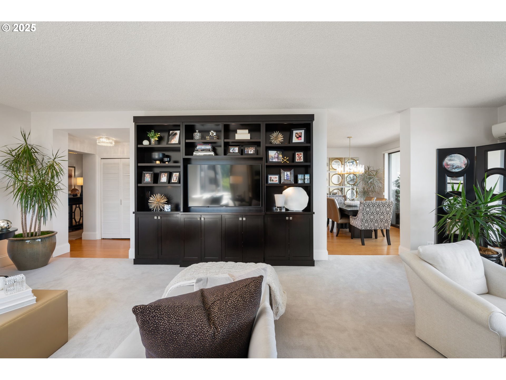 2221 Southwest 1st Avenue, Unit 2225 Portland, OR 97201 - Photo 8 of 47 a living room with furniture and potted plants