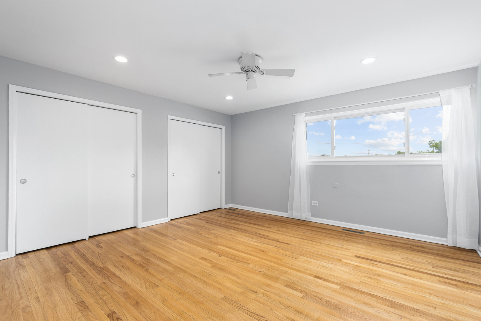 2008 Maple Avenue Northbrook, IL 60062 - Photo 10 of 16 a view of empty room with wooden floor and fan