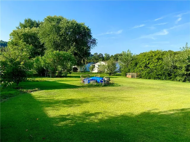 a view of a garden with an outdoor space